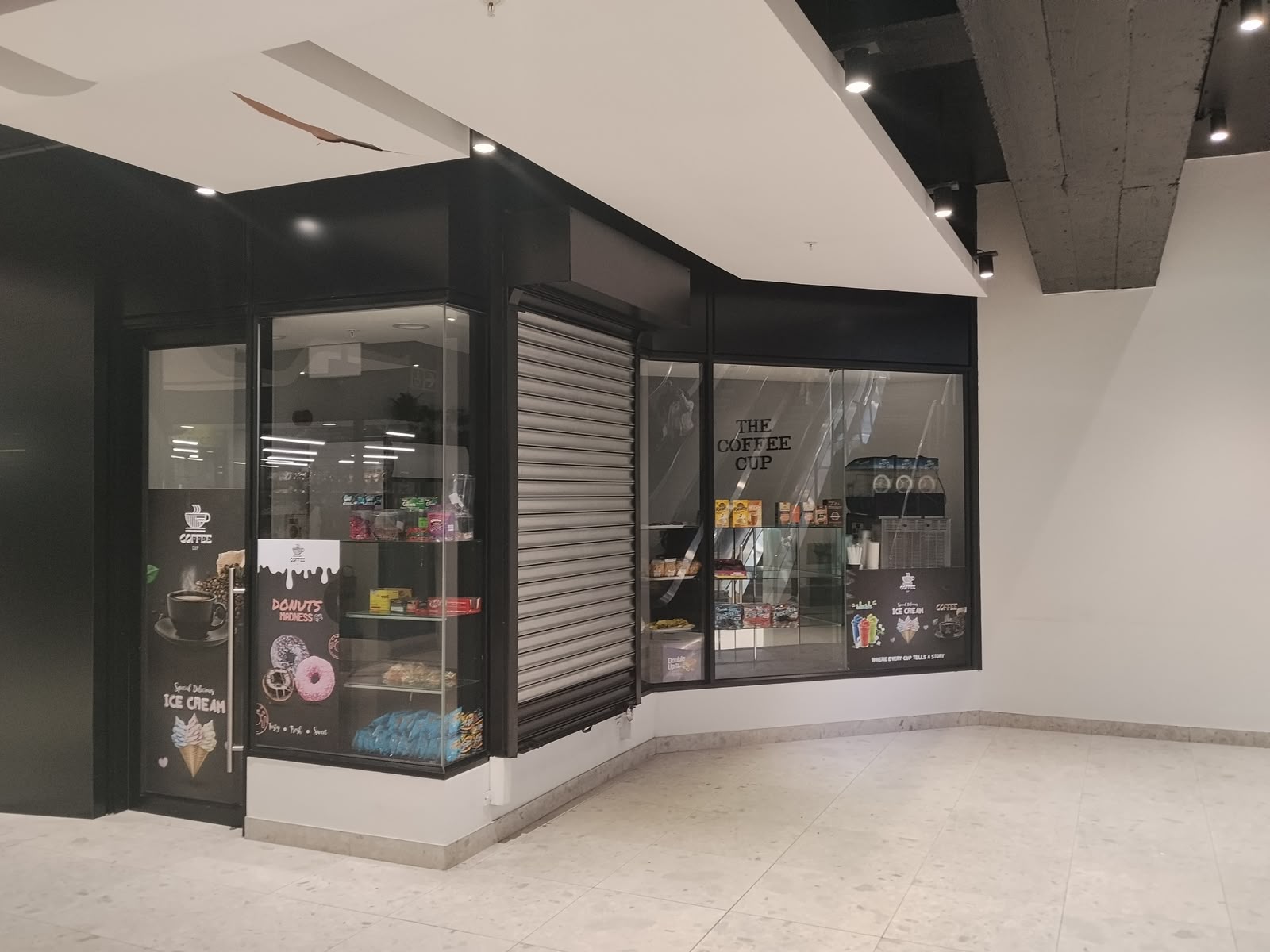 The Coffee Cup storefront — before