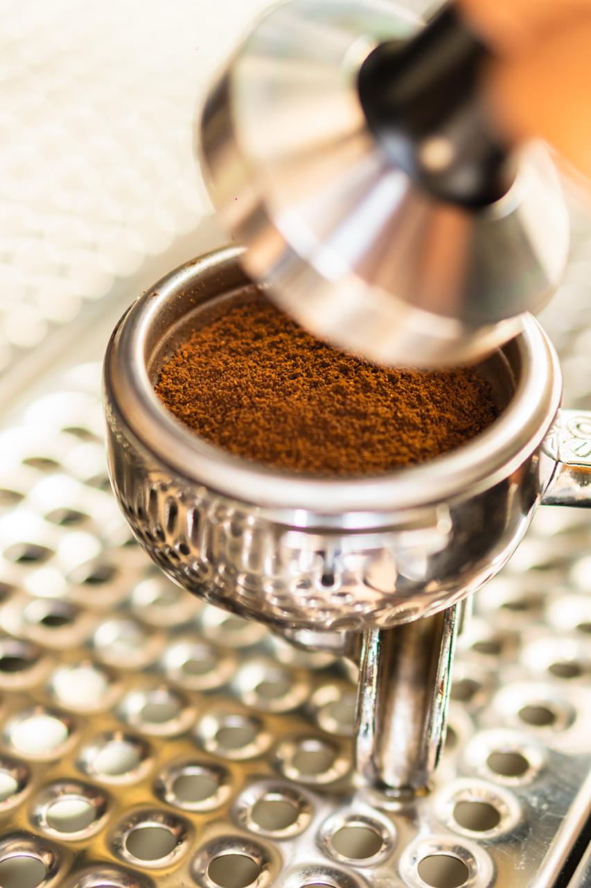 Freshly ground espresso in the portafilter