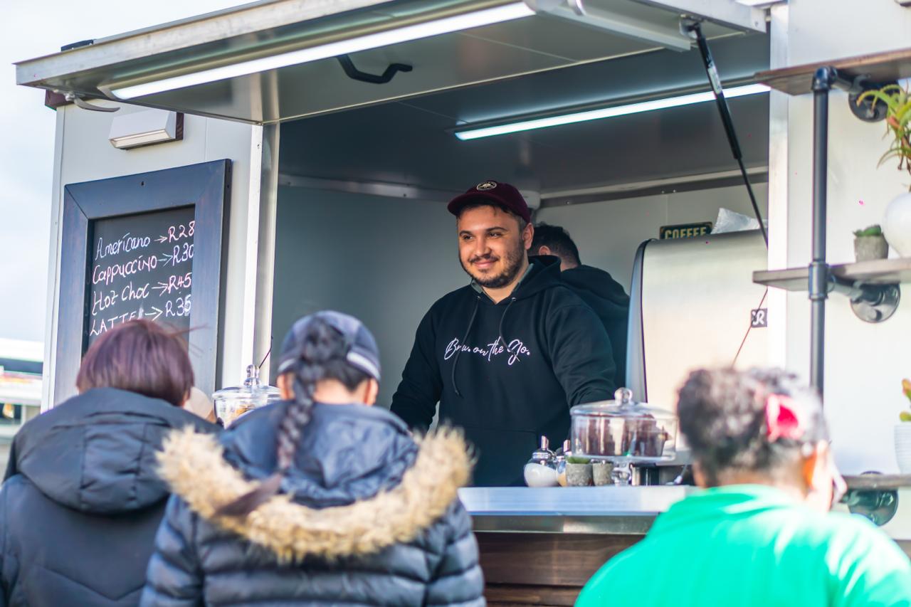 Customers ordering at the BRU. truck window